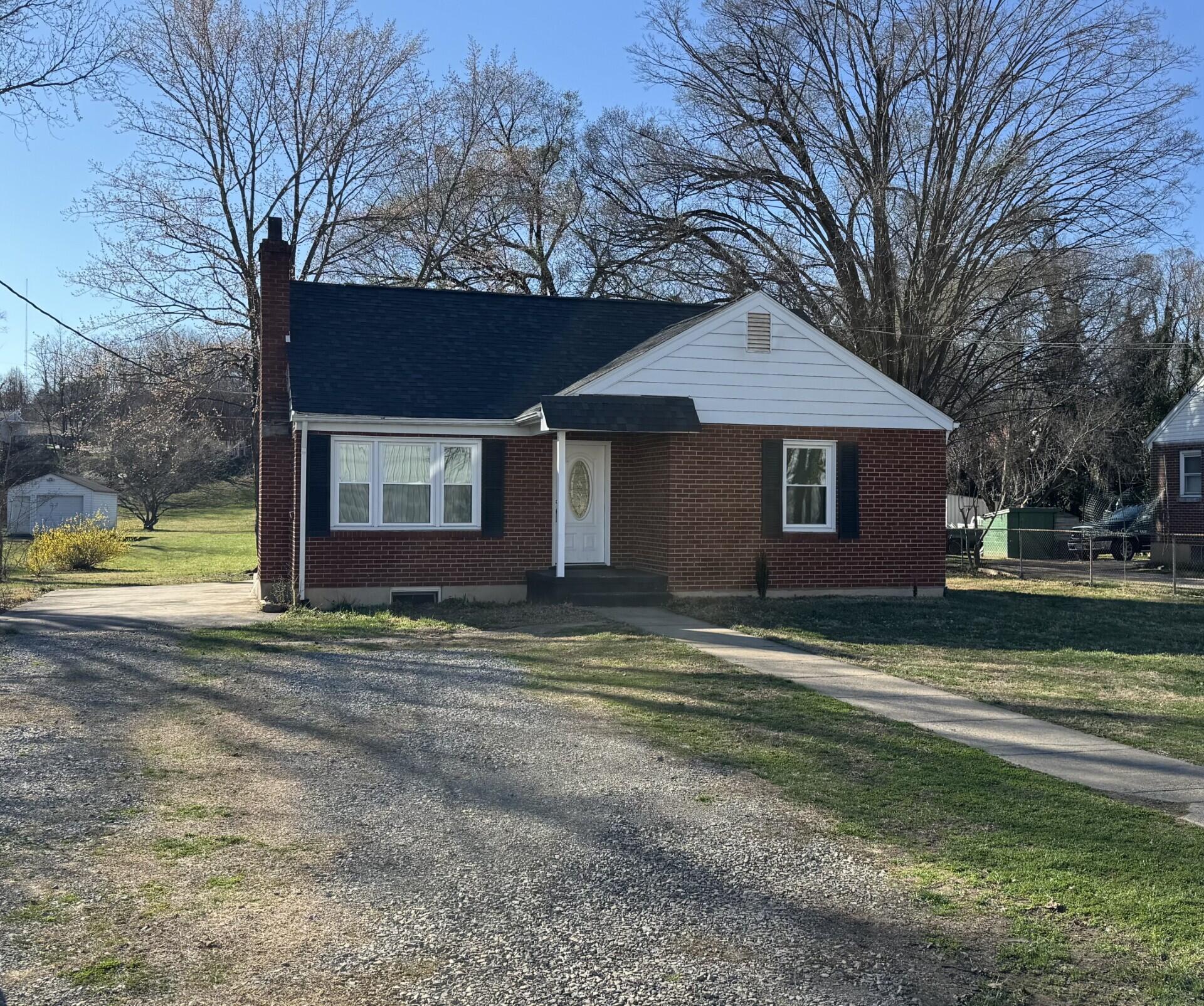 509 Kessler Mill Road, Unit 509 Salem, VA 24153 - Photo 1 of 30 a view of a house with a big yard and large trees