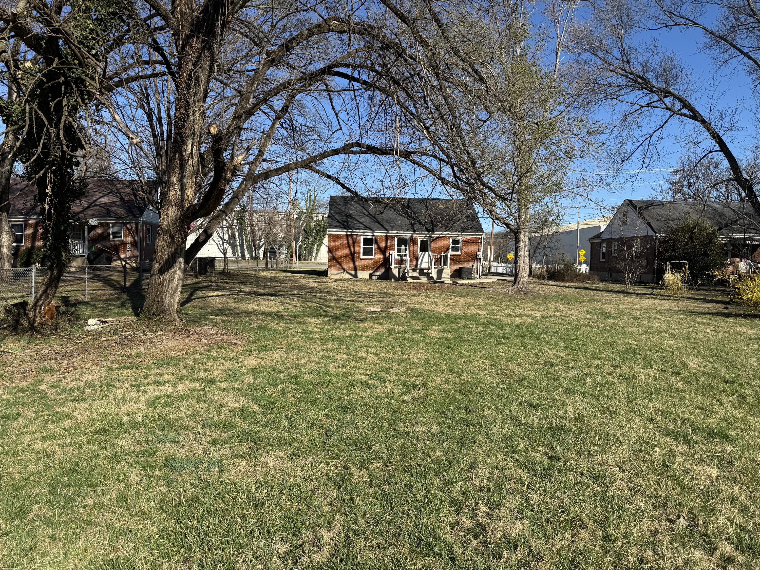 509 Kessler Mill Road, Unit 509 Salem, VA 24153 - Photo 16 of 30 a view of a yard with a house and a large tree