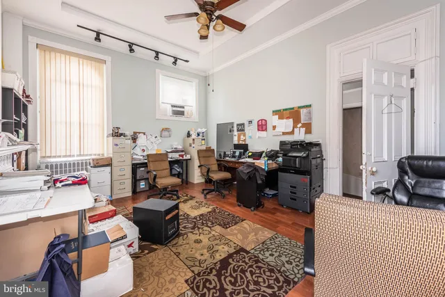 a kitchen with sink refrigerator and window
