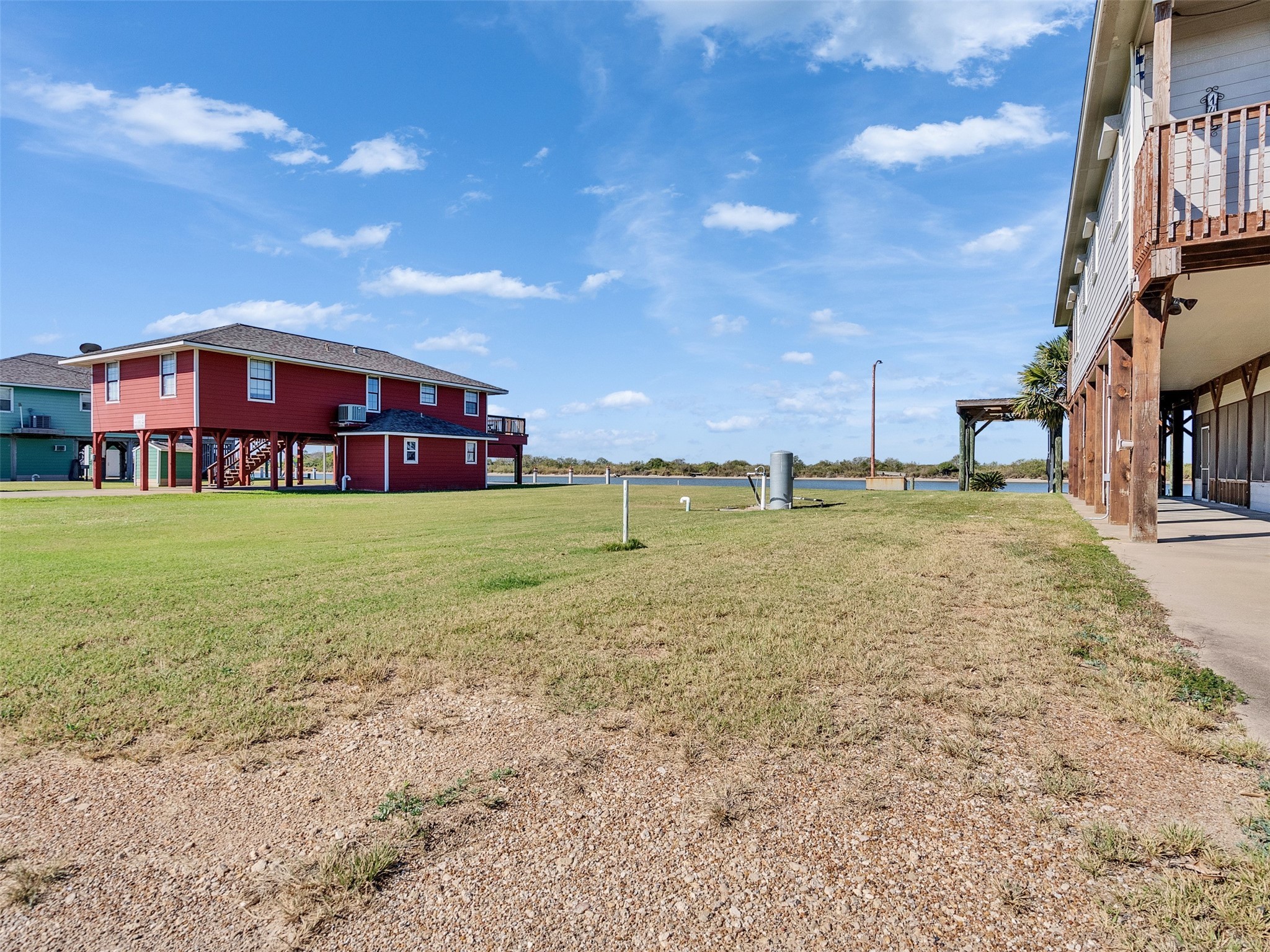 0 Fm-2031 Beach Road Matagorda, TX 77457 - Photo 12 of 16 a view of a house with a yard