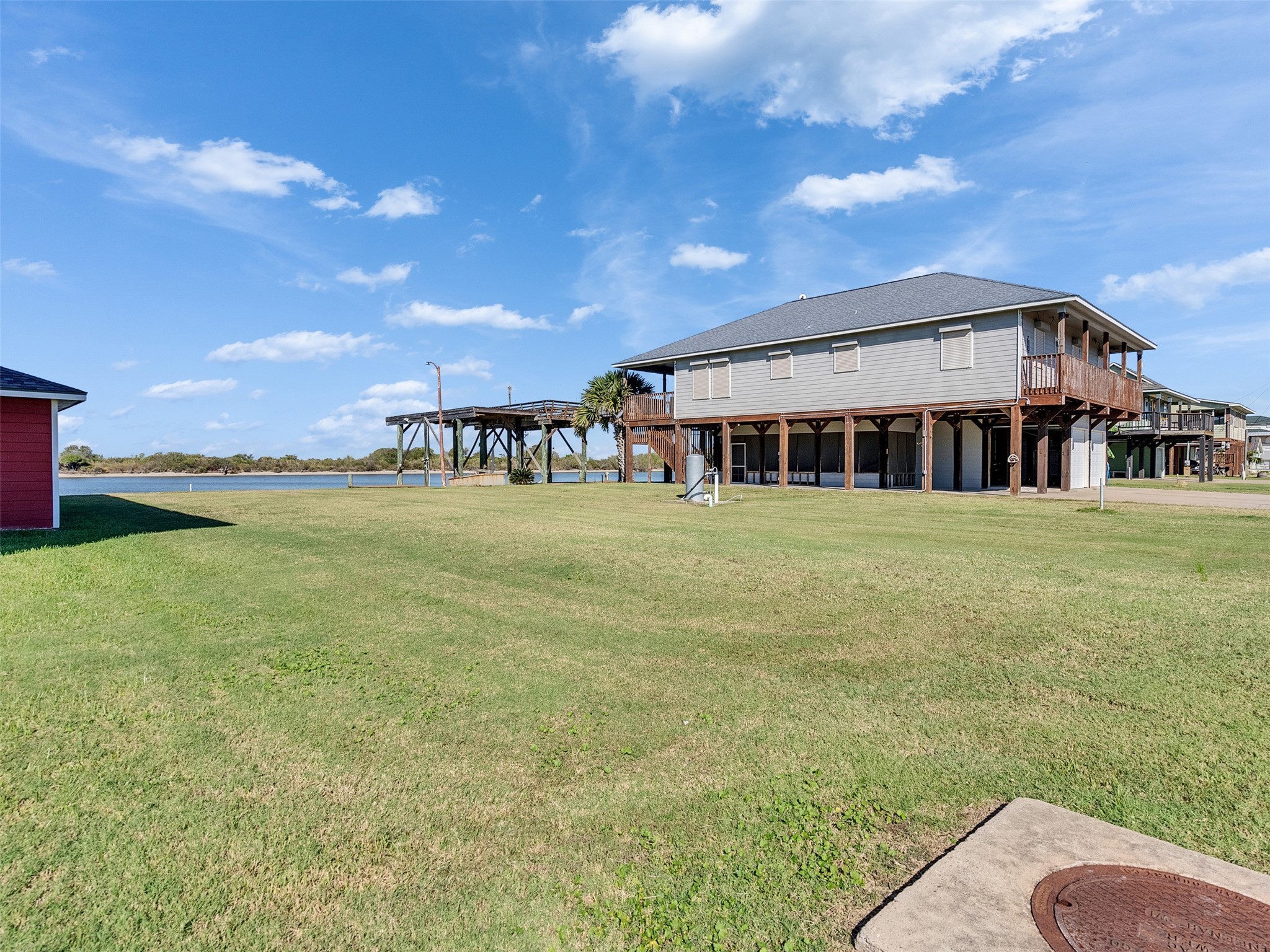 0 Fm-2031 Beach Road Matagorda, TX 77457 - Photo 13 of 16 a view of a house with a yard