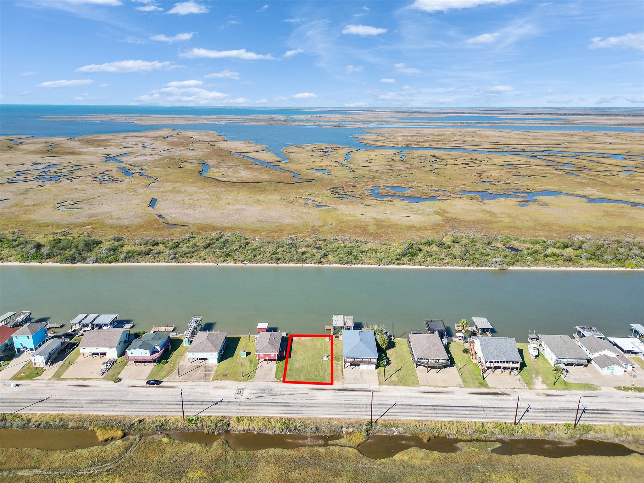0 Fm-2031 Beach Road Matagorda, TX 77457 - Photo 9 of 16 a view of a lake with a nearby beach
