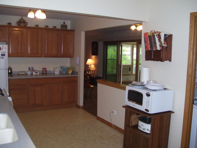 360 Ahlstrand Road Lombard, IL 60148 - Photo 14 of 21 a room with a sink cabinets and utility room
