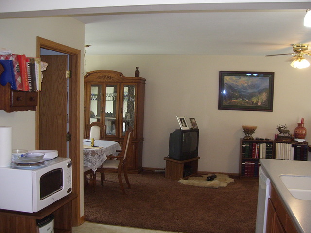360 Ahlstrand Road Lombard, IL 60148 - Photo 18 of 21 a view of a workspace with furniture and toys