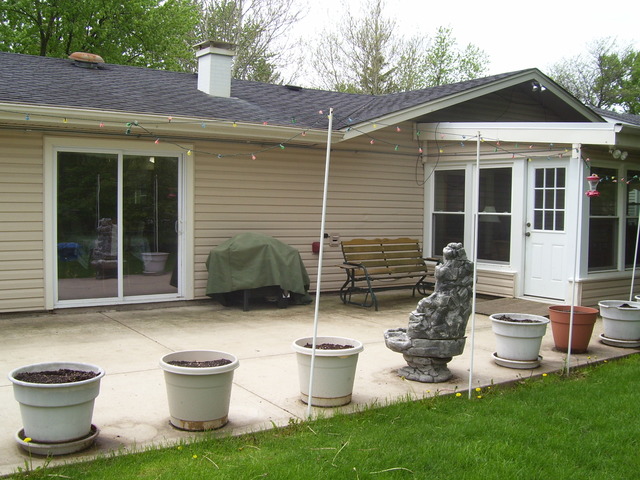 360 Ahlstrand Road Lombard, IL 60148 - Photo 19 of 21 a front view of a house with garden and porch