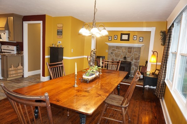 15 Mulpus Road Shirley, MA 01464 - Photo 3 of 30 a view of a dining room with furniture and a chandelier