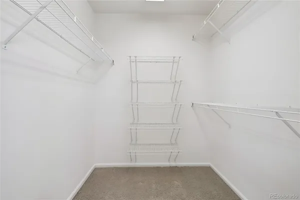 a view of an empty walk in closet