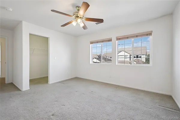 an empty room with windows