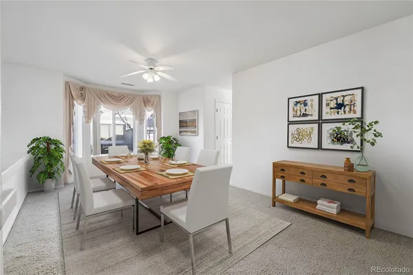 a view of a dining room with furniture