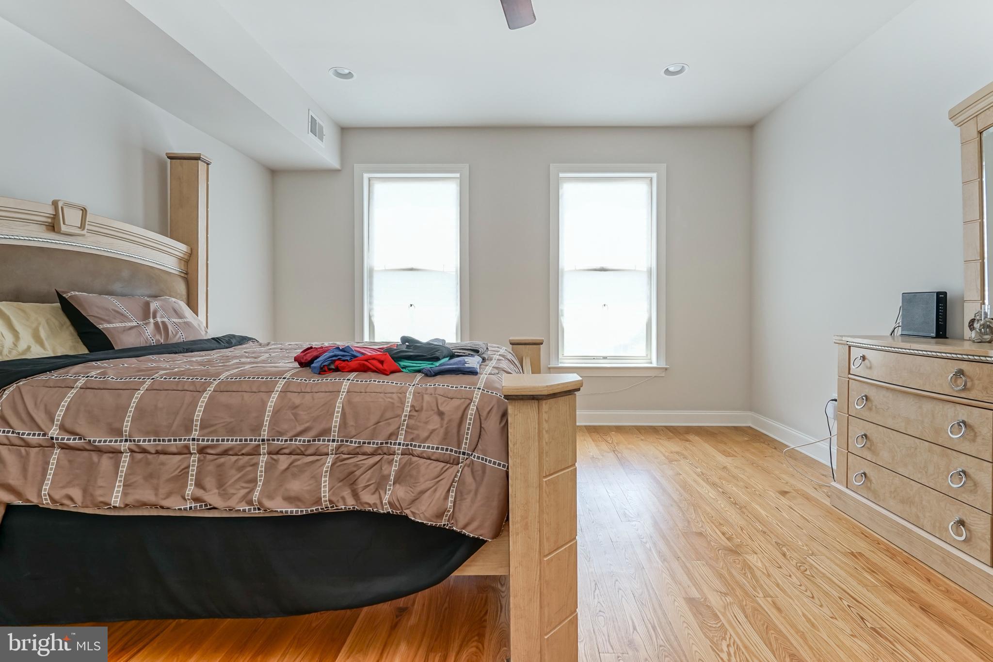 2332 Ellsworth Street Philadelphia, PA 19146 - Photo 11 of 29 a bedroom with a bed and a window