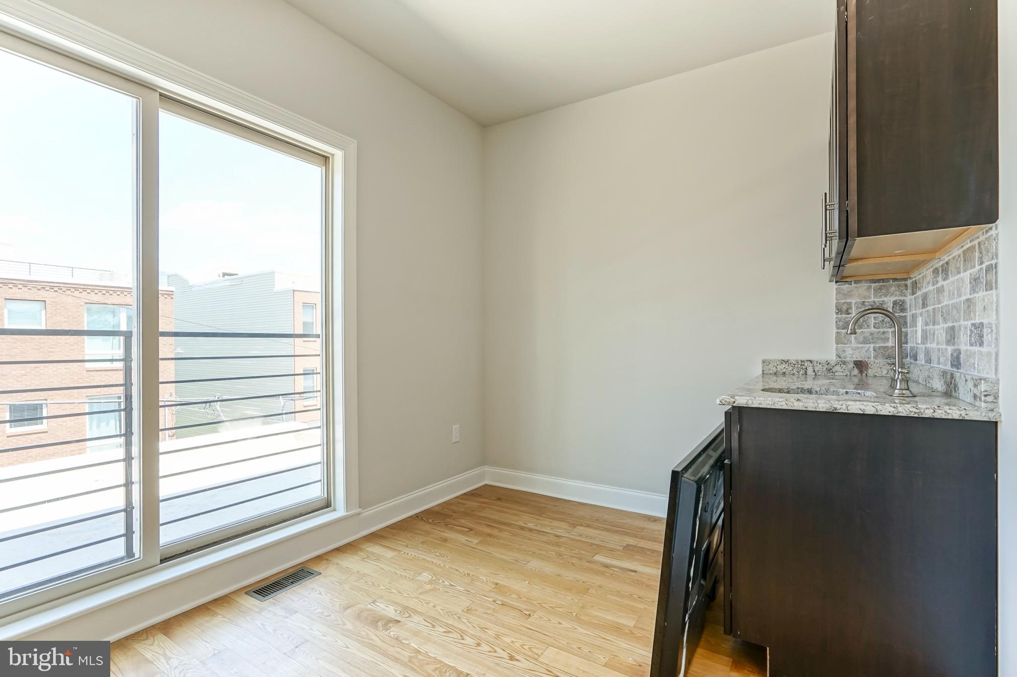 2332 Ellsworth Street Philadelphia, PA 19146 - Photo 17 of 29 a bathroom with a sink and a mirror