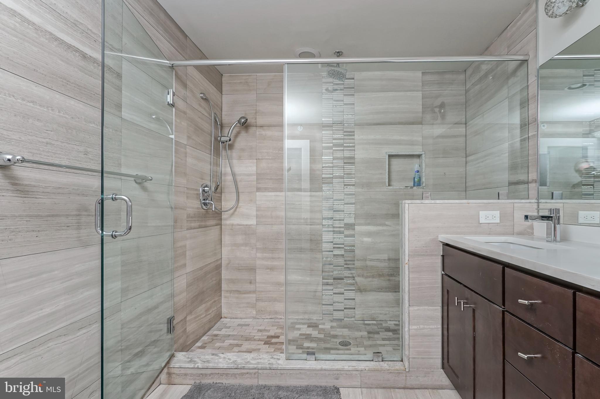 2332 Ellsworth Street Philadelphia, PA 19146 - Photo 18 of 29 a bathroom with a shower and a sink