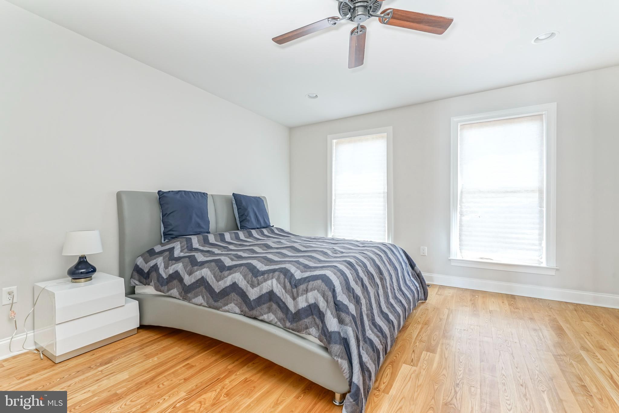 2332 Ellsworth Street Philadelphia, PA 19146 - Photo 20 of 29 a bedroom with a bed and a window