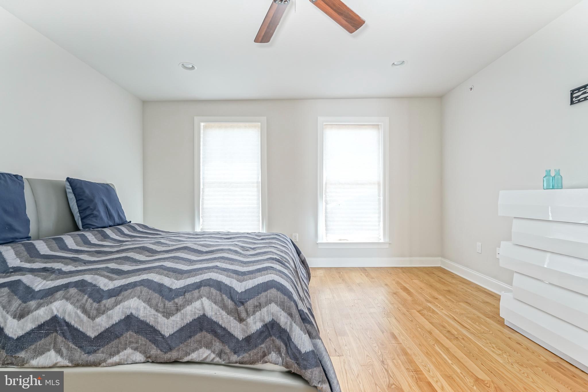 2332 Ellsworth Street Philadelphia, PA 19146 - Photo 21 of 29 a bedroom with a bed and a window