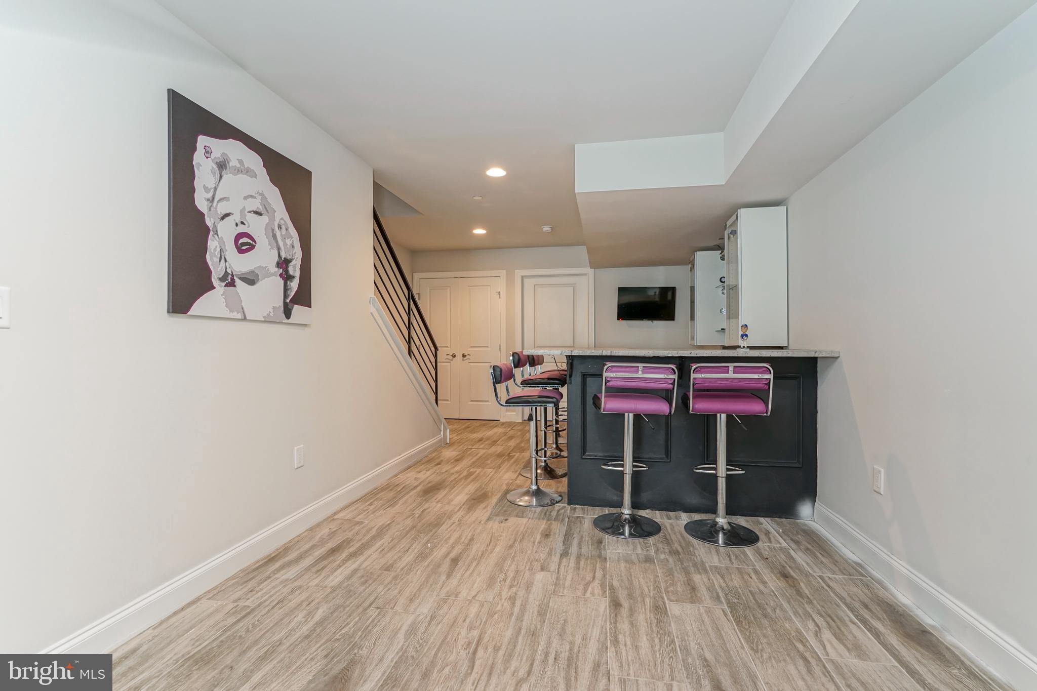 2332 Ellsworth Street Philadelphia, PA 19146 - Photo 24 of 29 a room with furniture and wooden floor