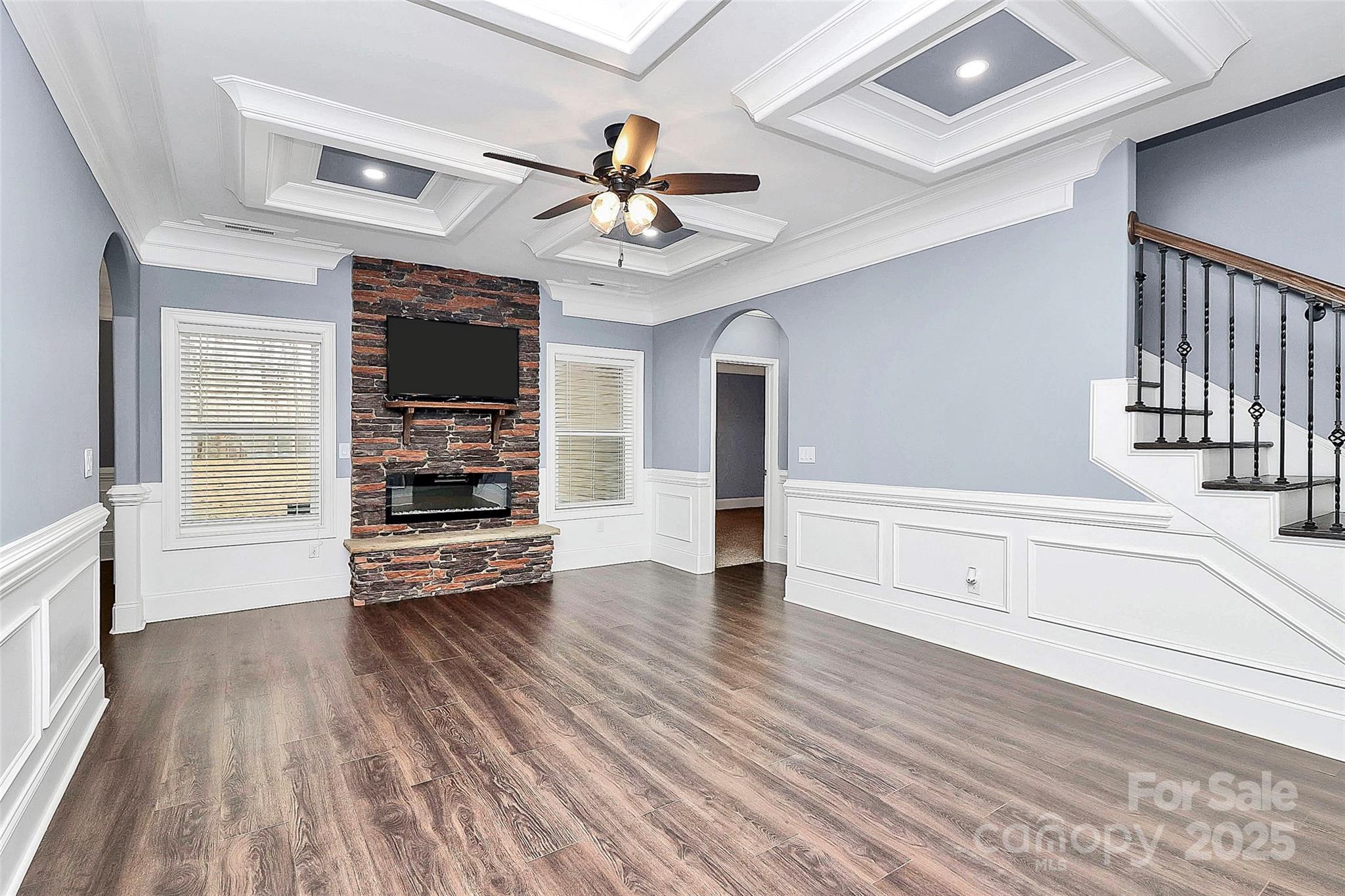 6519 Pargo Road Charlotte, NC 28216 - Photo 18 of 37 a view of an empty room with a window and wooden floor