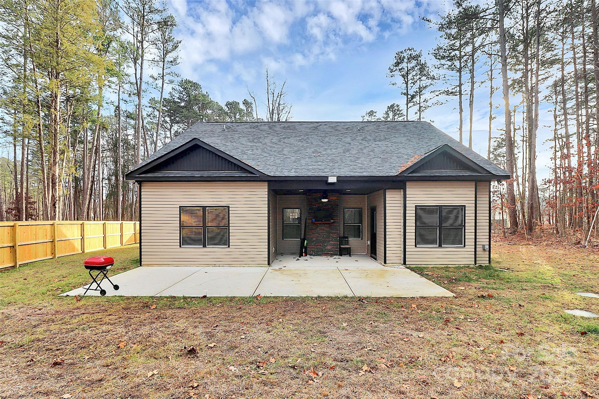 6519 Pargo Road Charlotte, NC 28216 - Photo 34 of 37 a front view of a house with a yard and garage