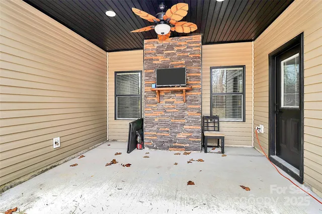 a bathroom with a large tree