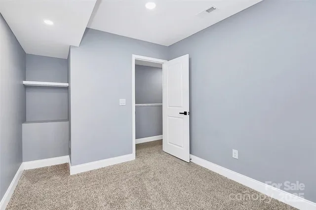 an empty room with closet