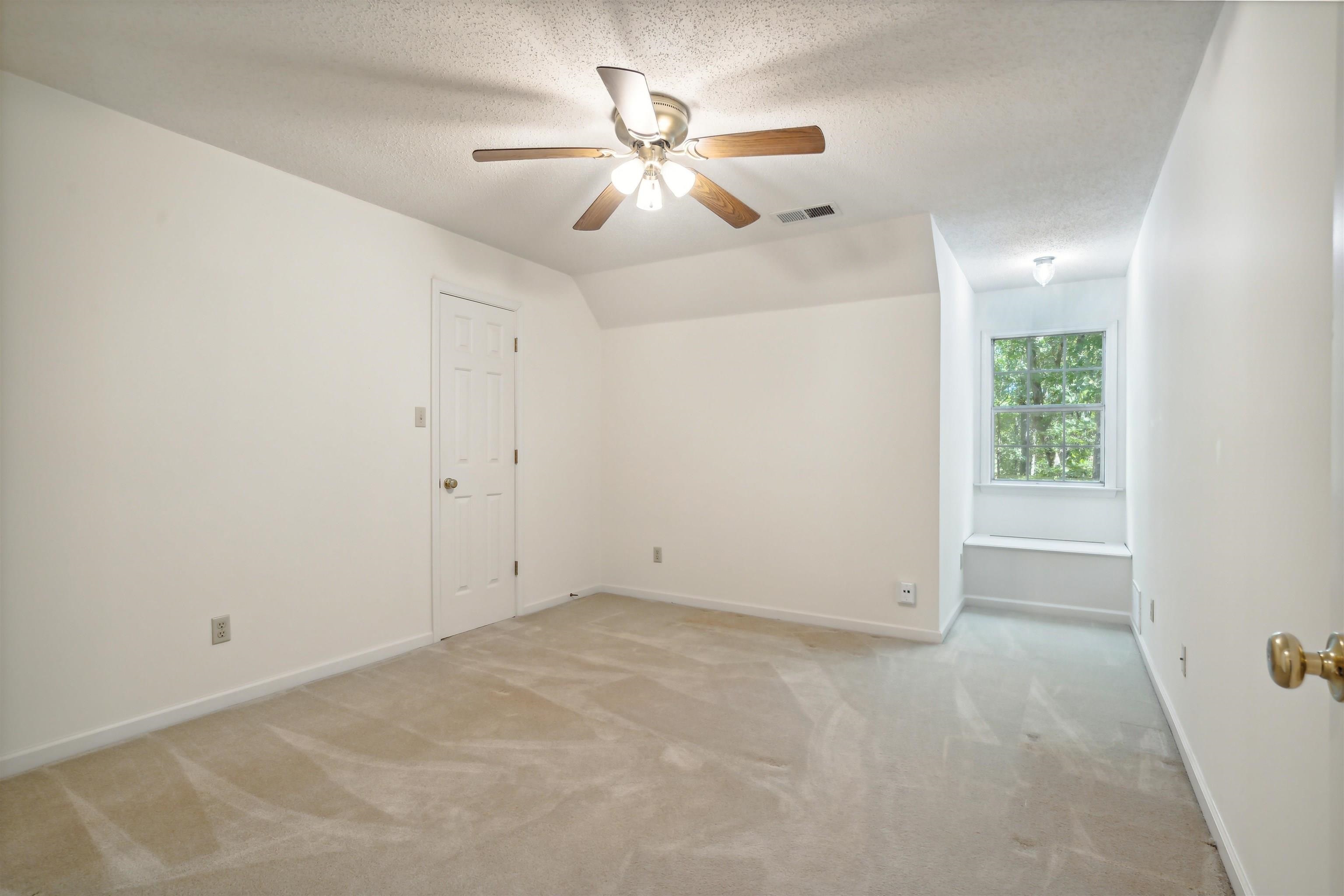 3255 Highway 196 Piperton, TN 38017 - Photo 19 of 22 an empty room with fan and windows
