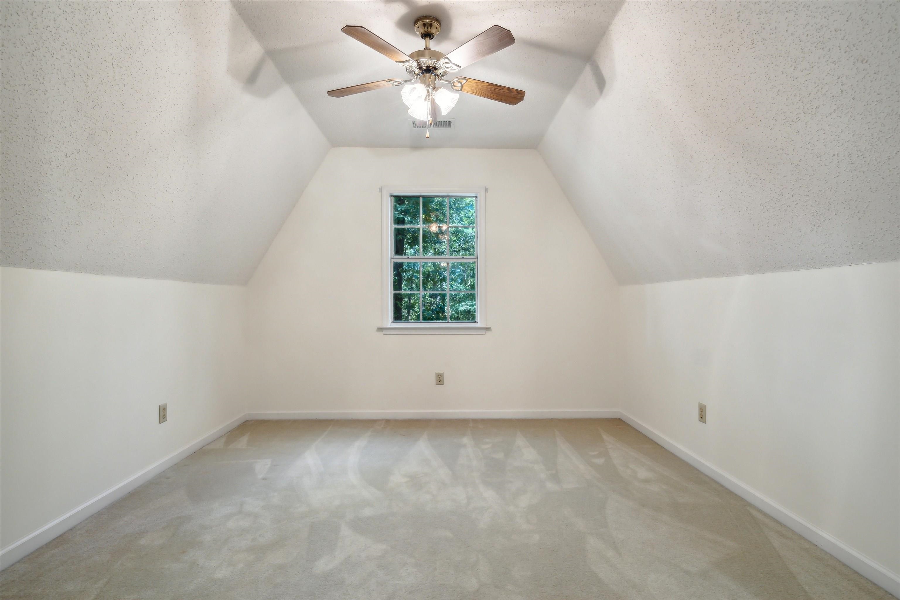 3255 Highway 196 Piperton, TN 38017 - Photo 20 of 22 an empty room with a window and a fan