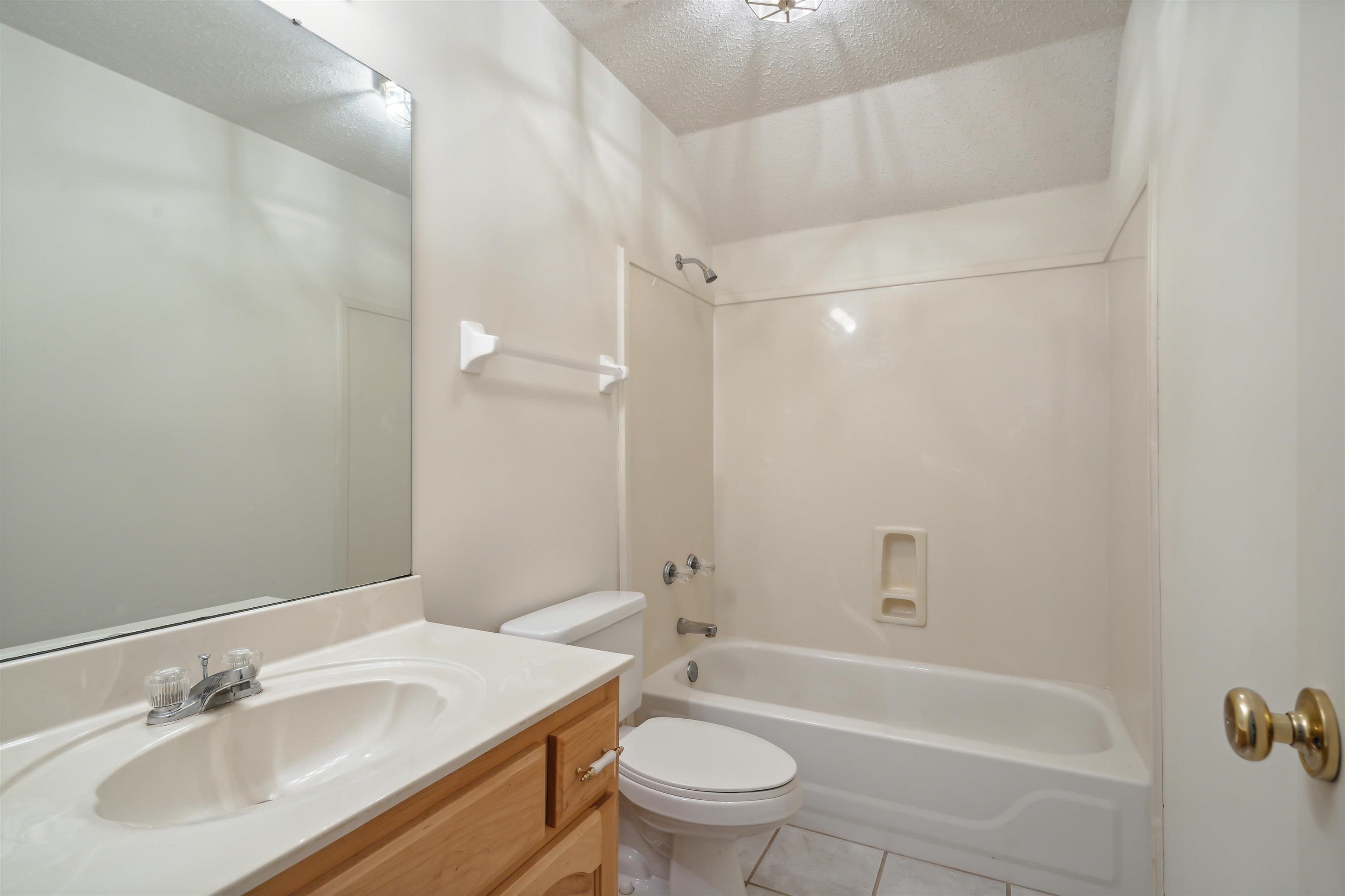 3255 Highway 196 Piperton, TN 38017 - Photo 22 of 22 a bathroom with a sink toilet and shower