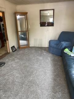 332 Lewis Street, Unit 1/2 Gilroy, CA 95020 - Photo 13 of 19 a living room with furniture and a flat screen tv