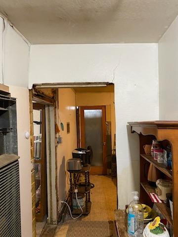 332 Lewis Street, Unit 1/2 Gilroy, CA 95020 - Photo 13 of 18 a view of a hallway with workspace