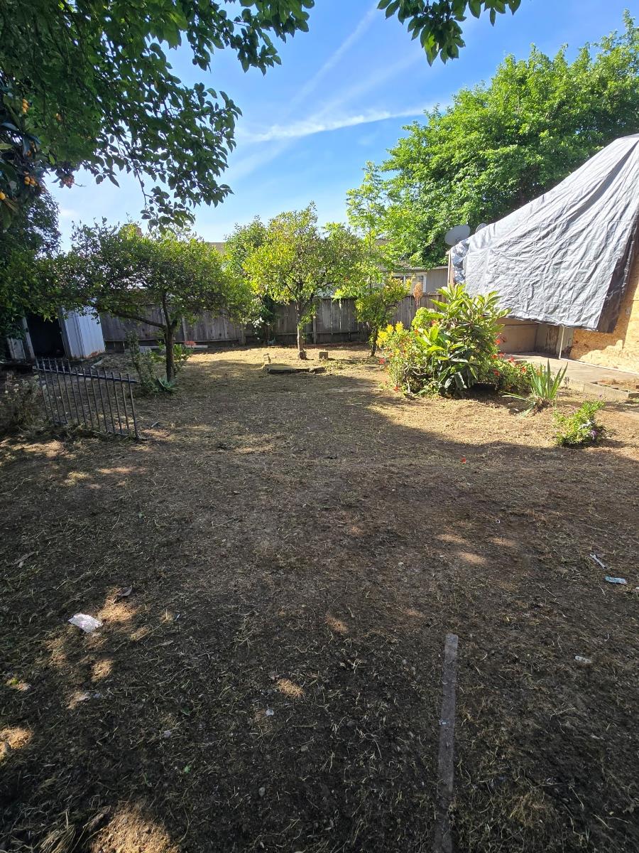 332 Lewis Street, Unit 1/2 Gilroy, CA 95020 - Photo 8 of 19 a view of backyard with green space