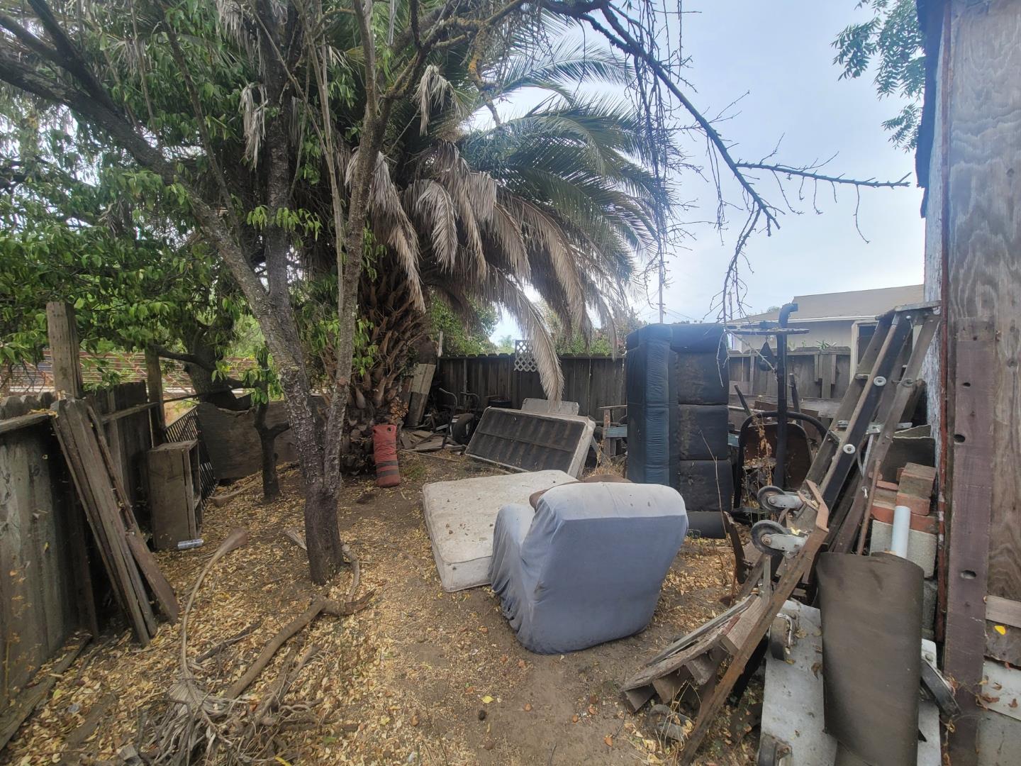 332 Lewis Street, Unit 1/2 Gilroy, CA 95020 - Photo 10 of 18 a view of a backyard with sitting area and furniture