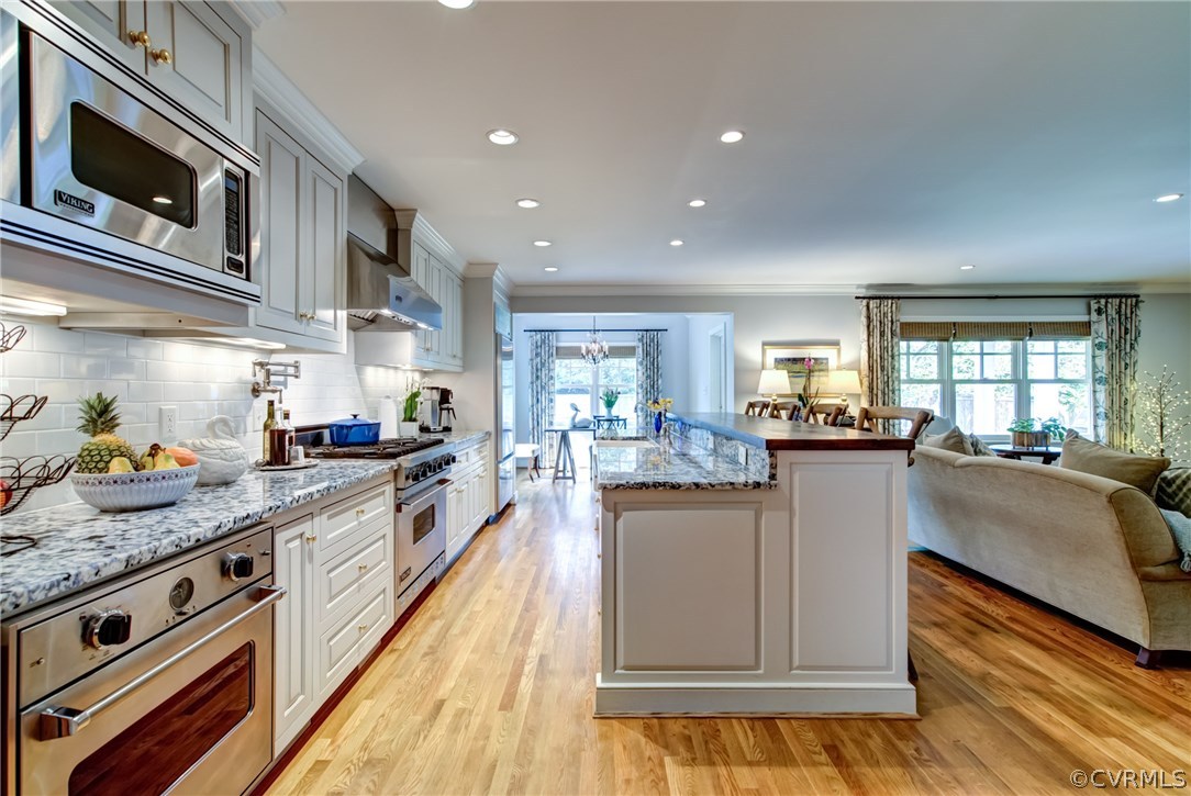 3910 Exeter Road Richmond, VA 23221 - Photo 18 of 39 Chef's kitchen open to breakfast room and family r
