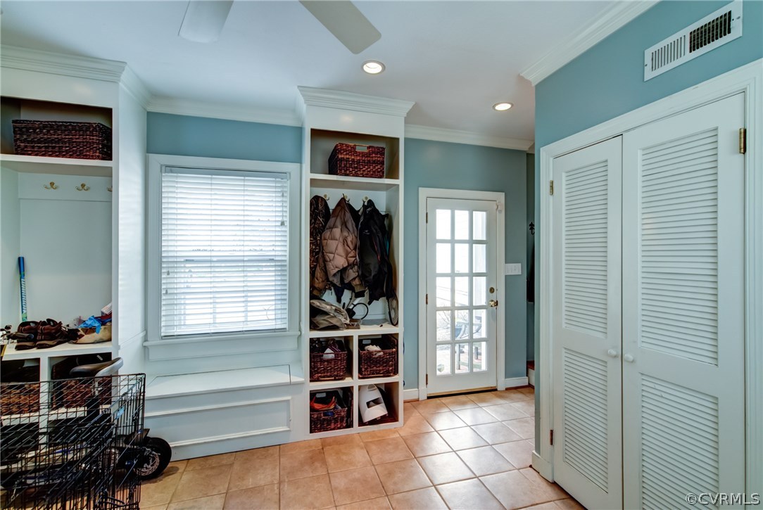 3910 Exeter Road Richmond, VA 23221 - Photo 28 of 39 Mud/Utility room with tile floor, built in shelves
