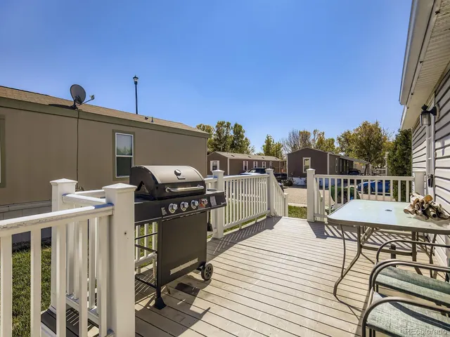 a view of a balcony with chairs