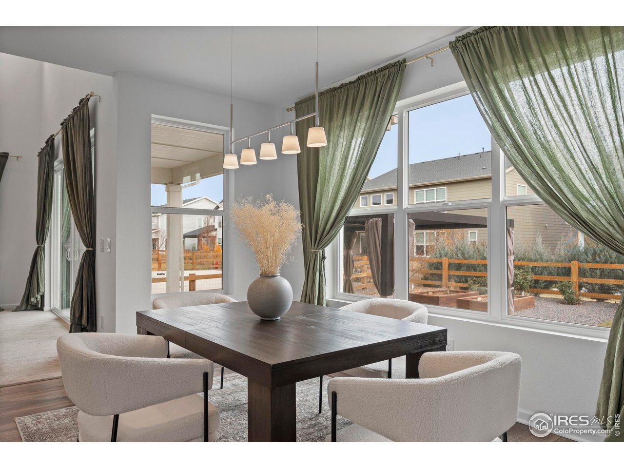 5070 Kidd Street Timnath, CO 80547 - Photo 19 of 42 a view of a living room and furniture