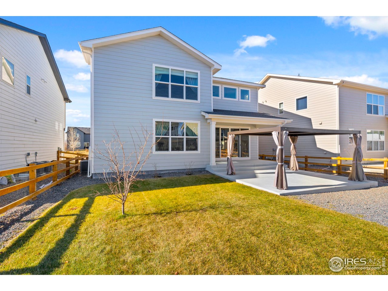 5070 Kidd Street Timnath, CO 80547 - Photo 34 of 42 a view of a house with swimming pool