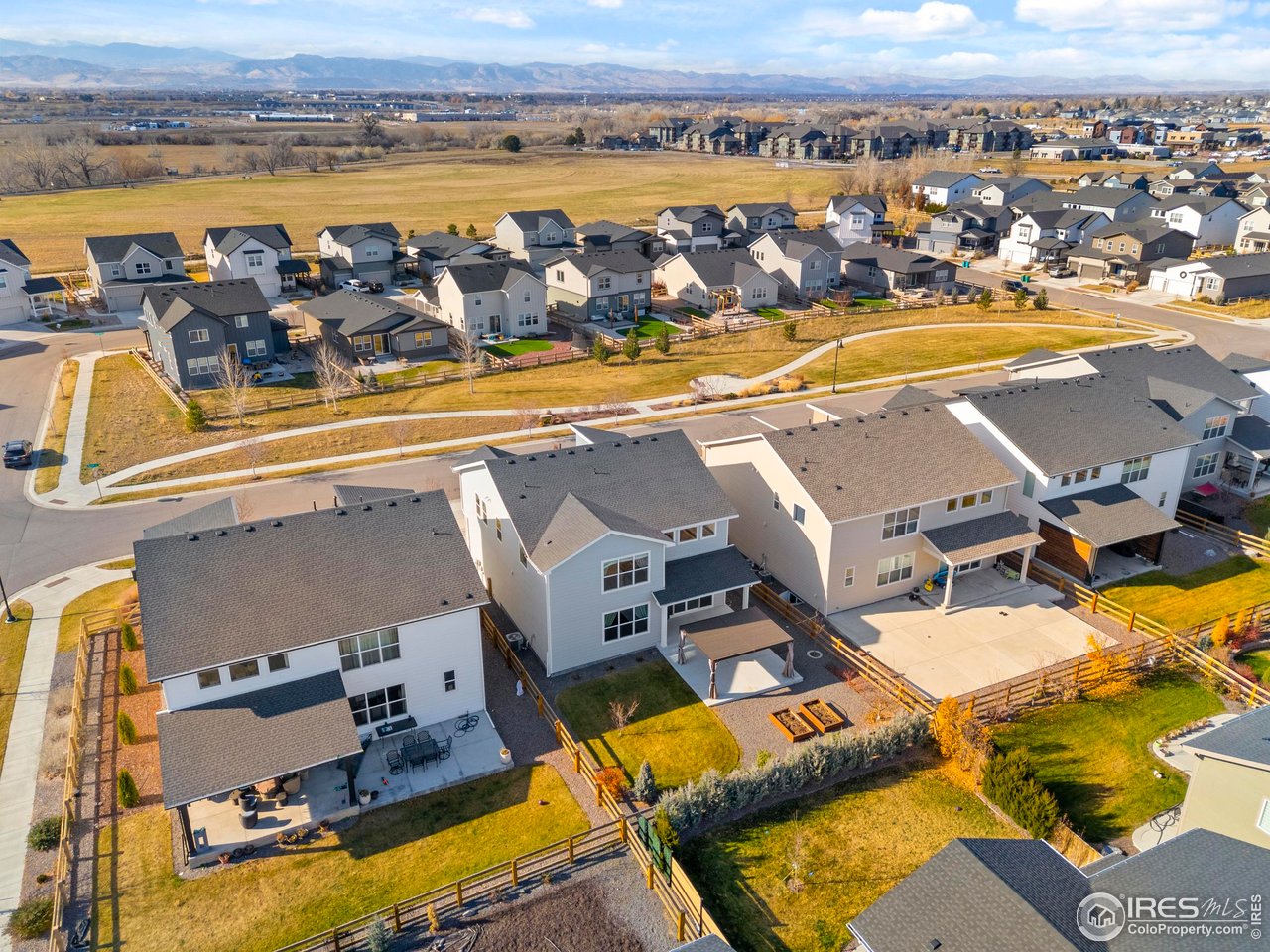 5070 Kidd Street Timnath, CO 80547 - Photo 37 of 42 an aerial view of residential houses with outdoor space and ocean view