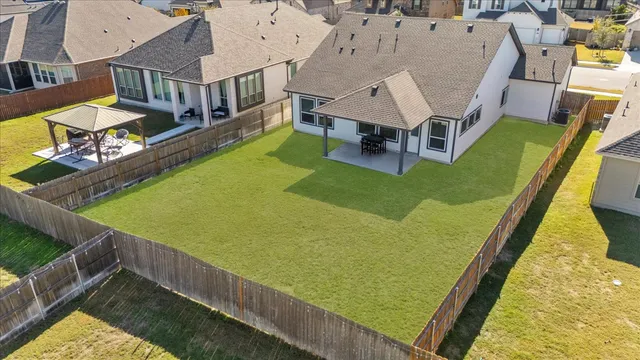 swimming pool view with a seating space