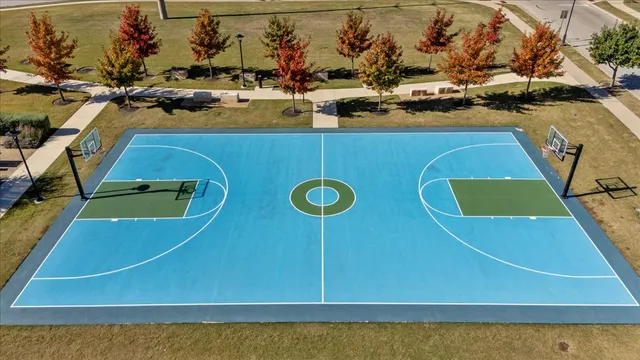a view of a swimming pool with outdoor seating