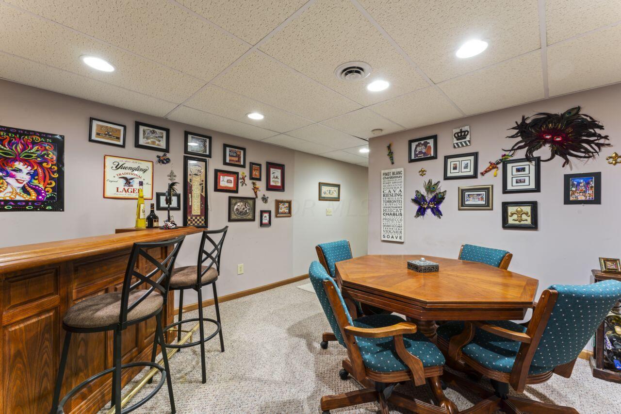1550 Swans Road Northeast Newark, OH 43055 - Photo 45 of 65 Finished Basement Bar and Poker Table