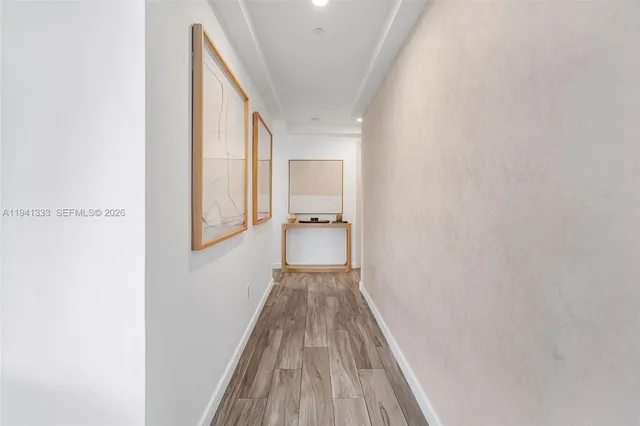 a kitchen with stainless steel appliances granite countertop a large stove a sink dishwasher and a refrigerator