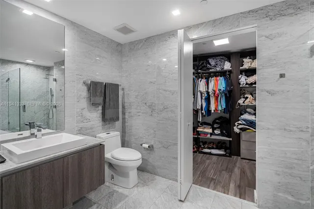 a view of a swimming pool with outdoor seating