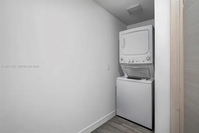 a view of a dinning table and chairs in the patio