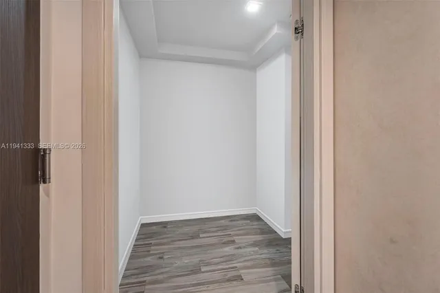 a view of a patio with a table and chairs