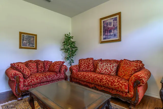 a living room with furniture and a couch