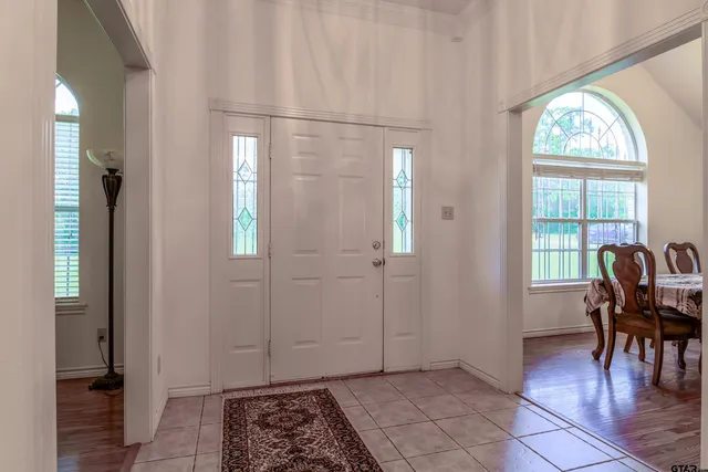 a view of livingroom with furniture and windows