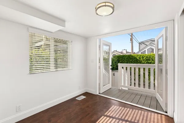 a view of entryway with wooden floor