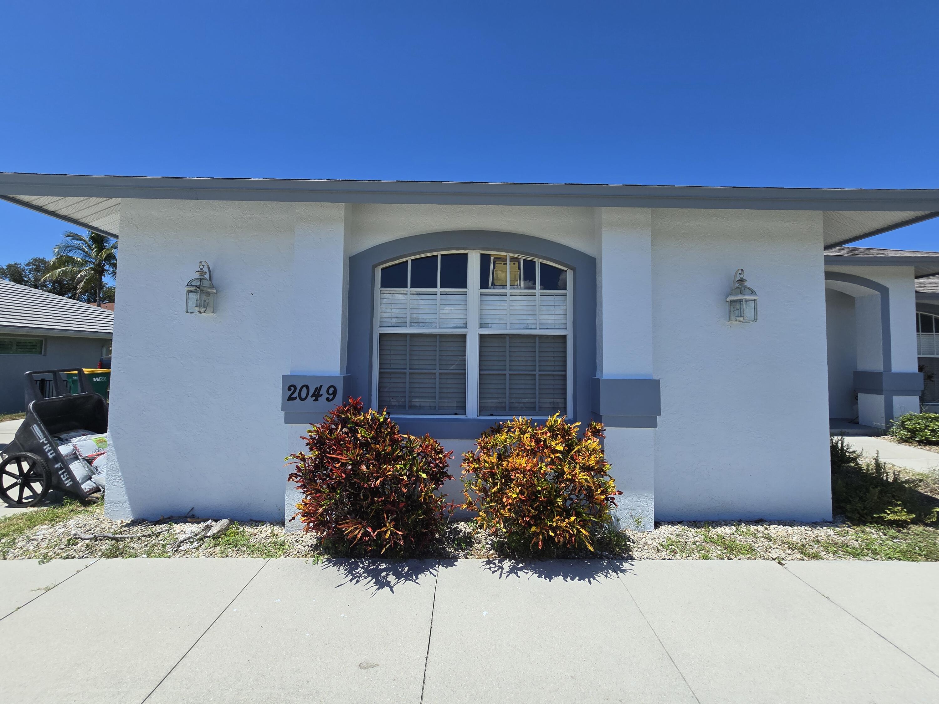 2049 San Marco Road Marco Island, FL 34145 - Photo 18 of 71 Front Facade of Garage!