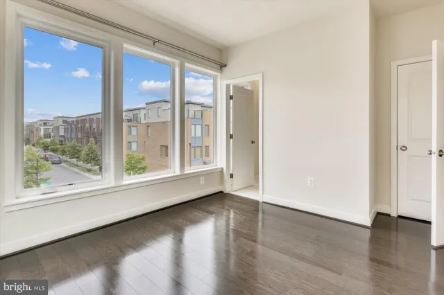 a bathroom with a shower sink and mirror