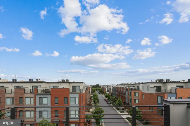 a view of a street with buildings