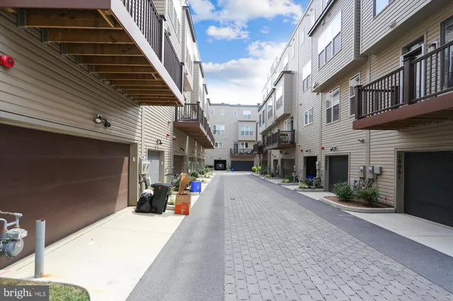 a view of a balcony with sitting area